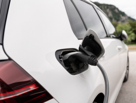 E-car at GIPRO insulators charged with green power