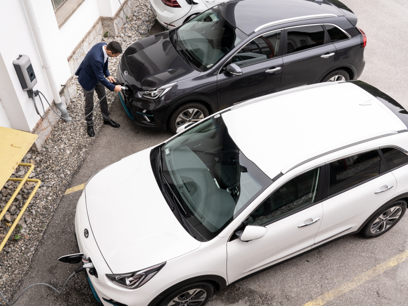 GIPRO Consultant Julian Englich "refueling" one of the new e-company cars